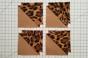 Half square triangles 8 at a time is the way to go if you need a lot of them. It's easier than you think!
