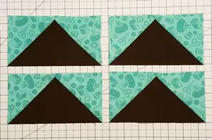 No waste flying geese are easy to make! Learn the technique, see a size chart and make four at a time for fast flying geese.