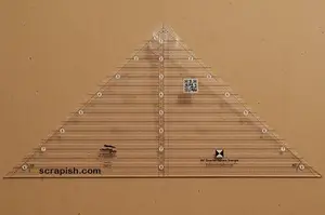 Find out how to use a quarter square triangle ruler and make quarter square triangles faster out of strips. See examples of quarter square triangles.