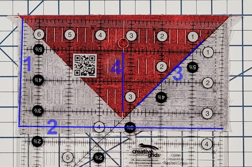 Step 10 4 Flying Geese At Once: properly align the ruler on the flying geese unit. Large triangle point (goose) facing south. Step 10 4 Flying Geese At Once: properly align the ruler on the flying geese unit. Large triangle point (goose) facing south.