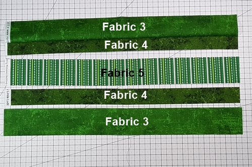 Step 1a Christmas Ornament Quilt Block Pattern: cut strips to make strip sets.
