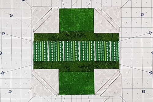 Step 4b Christmas Ornament Quilt Block Pattern: stitch on the drawn line and trim.