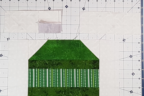 Step 6a Christmas Ornament Quilt Block Pattern: stitch left ornament cap section to side strip A1.