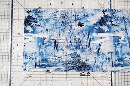 Step 1 Christmas Tree Quilt Block: align ruler on top of fabric. Step 1 Christmas Tree Quilt Block: align ruler on top of fabric.