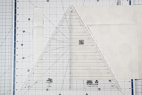 Step 3 Christmas Tree Quilt Block: align ruler to cut side triangles. Step 3 Christmas Tree Quilt Block: align ruler to cut side triangles.