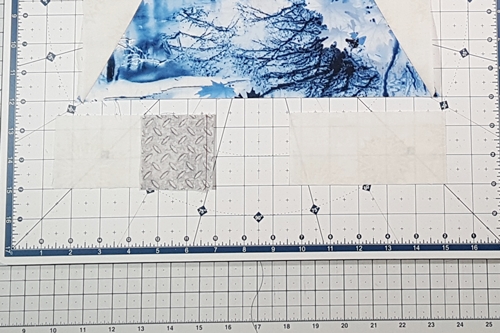 Step 8 Christmas Tree Quilt Block: stitch tree trunk to left background fabric. Step 8 Christmas Tree Quilt Block: stitch tree trunk to left background fabric.