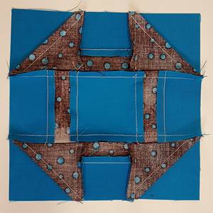 backside of churn dash quilt block pattern