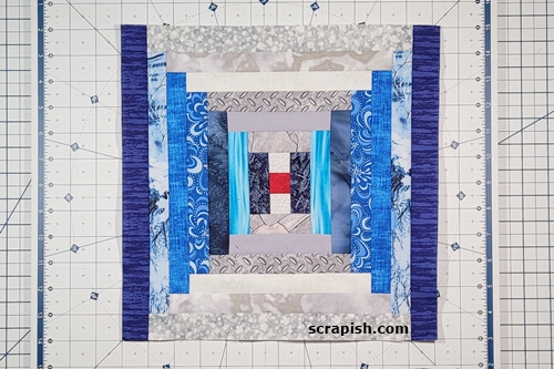 Picture of a Courthouse Steps Quilt Block Pattern: In the picture below, seven (7) rounds of 'logs' have been stitched to make a block that finishes at approximately 12 inches (12 1/2 
unfinished). Picture of a Courthouse Steps Quilt Block Pattern: In the picture below, seven (7) rounds of 'logs' have been stitched to make a block that finishes at approximately 12 inches (12 1/2 
unfinished).