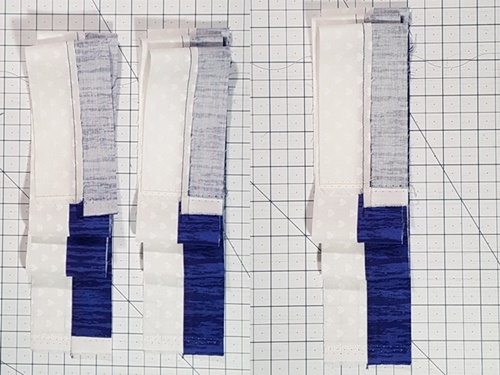 Step 3 Cross Quilt Pattern: From Fabric A and Fabric B make 3 strip sets. Press seams toward Fabric B.