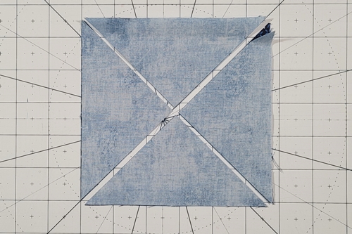 Double Friendship Star Quilt Block Tutorial: four quarter square triangle pairs are cut. Double Friendship Star Quilt Block Tutorial: four quarter square triangle pairs are cut.