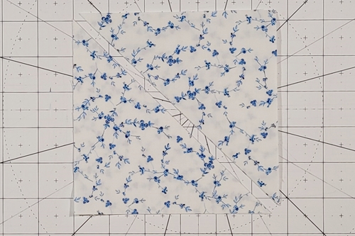 Double Friendship Star Quilt Block Tutorial Step 6: place both Fabric A HST squares on top of one another cut them in half along the left leaning (\) diagonal axis. Double Friendship Star Quilt Block Tutorial Step 6: place both Fabric A HST squares on top of one another cut them in half along the left leaning (\) diagonal axis.