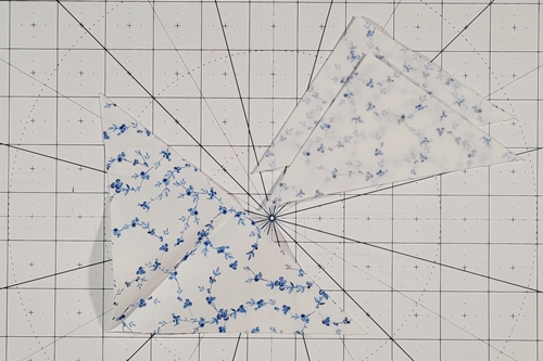 Double Friendship Star Quilt Block Tutorial Step 7: fold each of the four Fabric A HSTs in half along the diagonal cut. Press in a fold that will be used to center the QST units. Double Friendship Star Quilt Block Tutorial Step 7: fold each of the four Fabric A HSTs in half along the diagonal cut. Press in a fold that will be used to center the QST units.