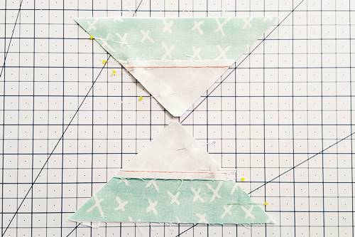 Step 6a Double Hourglass Quilt Block: Pair QST Number 3, right sides together, with QST Number 4. Pair QST Number 1, right sides together, with QST Number 2. Pin, nesting the seams.