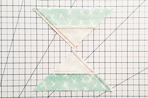 Step 6b Double Hourglass Quilt Block: With the blunt tip going under the needle first, stitch a 1/4 inch seam.