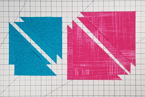 Step 3 Economy Quilt Block: Cut the squares to be used for inner and outer triangles in half once on the diagonal. Step 3 Economy Quilt Block: Cut the squares to be used for inner and outer triangles in half once on the diagonal.