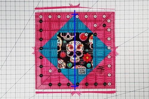 Step 11 Economy Quilt Block: Repeat Step 8 (one side at a time or two opposite sides at a time) to trim the economy block. Step 11 Economy Quilt Block: Repeat Step 8 (one side at a time or two opposite sides at a time) to trim the economy block.