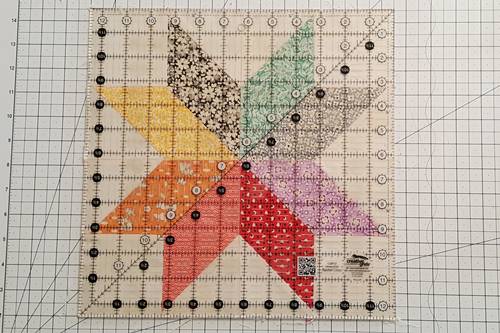 Step 13 Eight Point Star Quilt Block: trim the block to size.