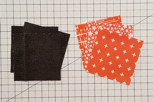 Step 2 Fall Leaf Quilt Block: From Fabrics A – C cut print squares. From fabrics the cut plain square.