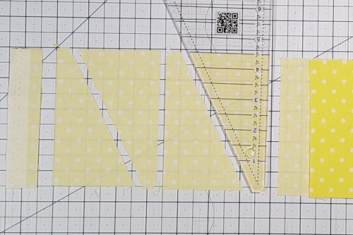 Step 1a Galaxy Star Quilt Block Variation Pattern: From Fabric A strip cut 4 side triangles using the Recs Triangle Ruler. Step 1a Galaxy Star Quilt Block Variation Pattern: From Fabric A strip cut 4 side triangles using the Recs Triangle Ruler.