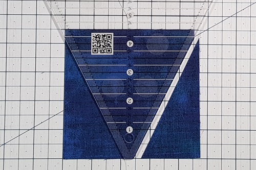 Step 2c Galaxy Star Quilt Block Variation Pattern: Cut along the right-hand side of the Tri ruler. Step 2c Galaxy Star Quilt Block Variation Pattern: Cut along the right-hand side of the Tri ruler.