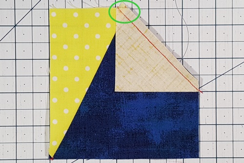 Step 3c Galaxy Star Quilt Block Variation Pattern: Stitch the remaining portion of the small square to the larger square. Step 3c Galaxy Star Quilt Block Variation Pattern: Stitch the remaining portion of the small square to the larger square.