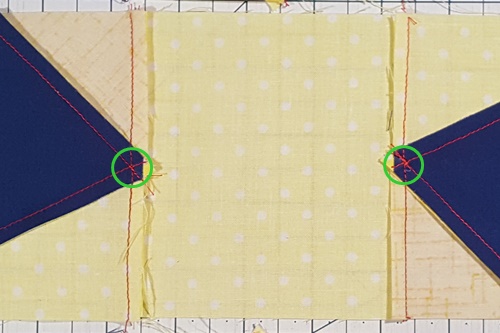 Keep your star points. Stitch just above the point where the seams of the triangles intersect. Keep your star points. Stitch just above the point where the seams of the triangles intersect.