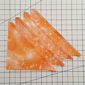 Step 6 Half square triangle ruler: stitch each HST with a 1/4 inch seam. Step 6 Half square triangle ruler: stitch each HST with a 1/4 inch seam.