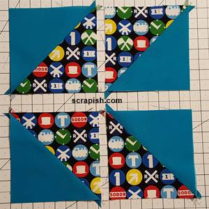 half square triangles cut using directional fabric