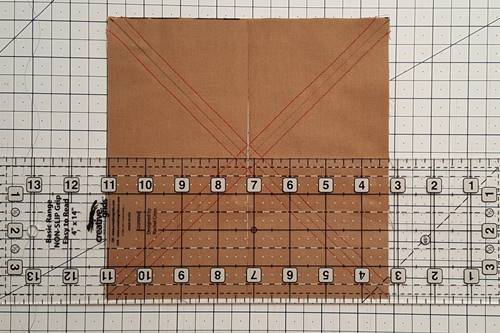 Step 4 Place a quilting ruler through the horizontal center of the squares and make a cut through the center of the squares. Step 4 Place a quilting ruler through the horizontal center of the squares and make a cut through the center of the squares.