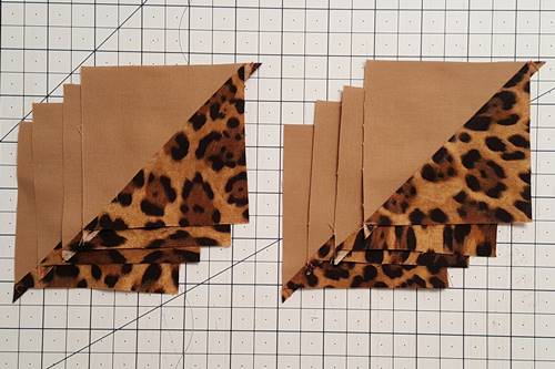 Step 7 Open the half square triangles and press the seams towards the darker fabric. Step 7 Open the half square triangles and press the seams towards the darker fabric.