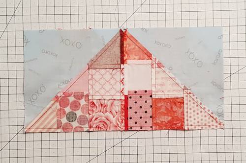 Step 12 Heart Quilt Block Pattern: With right sides together nest seams and stitch Rows 1 and 2 using a 1/4 inch seam. Step 12 Heart Quilt Block Pattern: Step 12 Heart Quilt Block Pattern: With right sides together nest seams and stitch Rows 1 and 2 using a 1/4 inch seam.