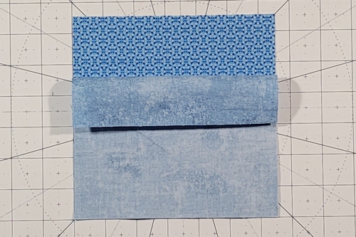 Hope of Hartford Quilt Block Tutorial Step 1: Place QST squares right sides together, background square on top.