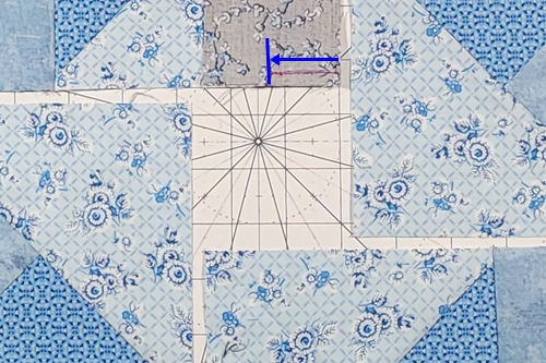 Hope of Hartford Quilt Block Step 9: 
Right sides together, place center square in lower right corner of unit A/B. Stitch 1/4 inch seam to middle of center square. Back stitch at beginning and end.