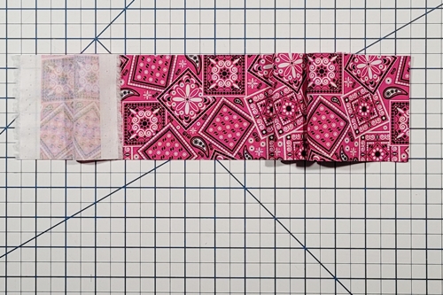 How to Make Flying Geese Step 1: cut half square triangles from strips. Fold your strip of fabric in half with right sides (or wrong sides) together for mirror image half square triangles.