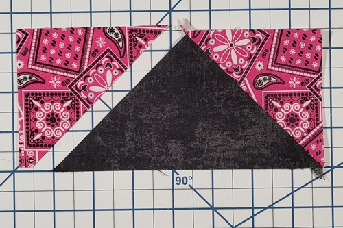 How to Make Flying Geese Step 13: flip HST right side up. Press seam open.