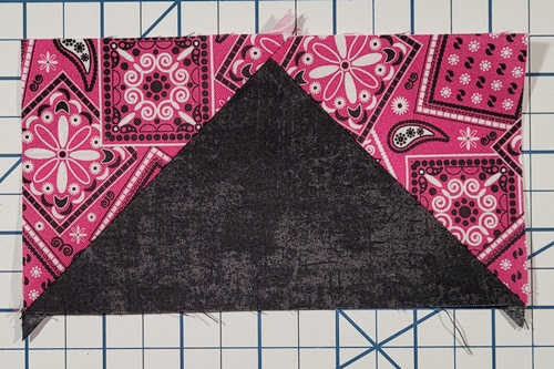 How to Make Flying Geese Step 15: flip HST right side up. Press seam open.