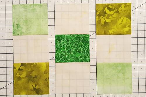 Step 4a Irish Chain Quilt Block: Arrange the units to make the block.