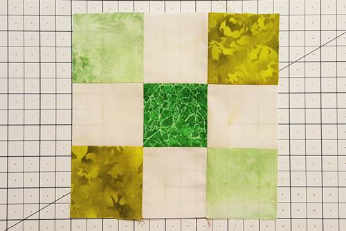 Step 4e Irish Chain Quilt Block: open units to right sides up.