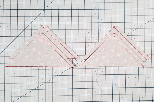 Step 2a Ohio Star Quilt Block Pattern: With the flat tip going under the needle first, stitch a 1/4 inch seam on all the quarter square triangles along right edge. Step 2a Ohio Star Quilt Block Pattern: With the flat tip going under the needle first, stitch a 1/4 inch seam on all the quarter square triangles along right edge.