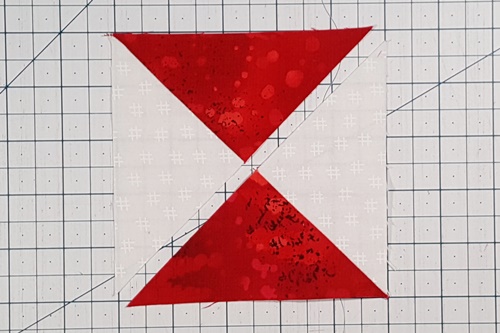 Step 3a Ohio Star Quilt Block Pattern: Orient the two sets of the quarter square triangles to make a square. Step 3a Ohio Star Quilt Block Pattern: Orient the two sets of the quarter square triangles to make a square.