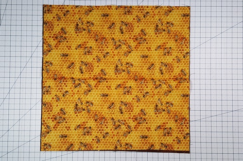 Step 4 Orange Peel Quilt Block: Unfold the squares to reveal the pressed in registration marks along the sides. Step 4 Orange Peel Quilt Block: Unfold the squares to reveal the pressed in registration marks along the sides.