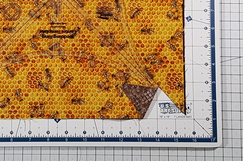 Step 7 Orange Peel Quilt Block: Begin the cut by placing the rotary cutter next to a bottom blunt tip and cut backwards to the edge of the fabric. Step 7 Orange Peel Quilt Block: Begin the cut by placing the rotary cutter next to a bottom blunt tip and cut backwards to the edge of the fabric.