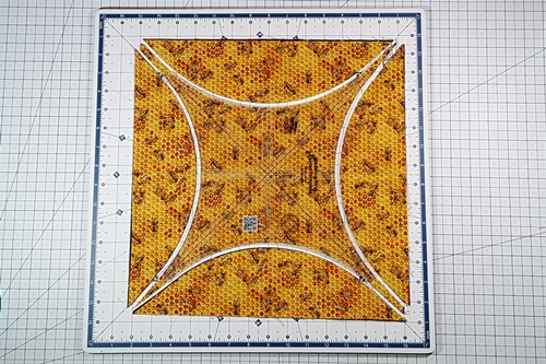 Step 9 Orange Peel Quilt Block: Cut along all four sides of the template piece to cut out the crescents, or half melons. Step 9 Orange Peel Quilt Block: Cut along all four sides of the template piece to cut out the crescents, or half melons.