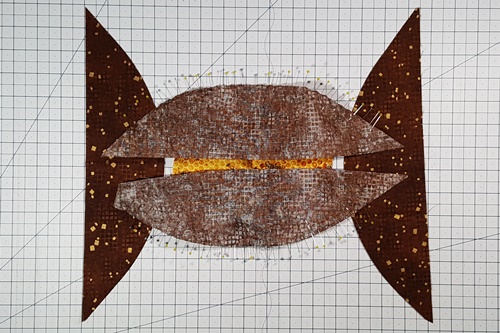 Step 12 Orange Peel Quilt Block: Right sides together, half melon on top. Match center registration marks. Pin. Stretch background to match curve of half melon. Do not stretch half melon. Step 12 Orange Peel Quilt Block: Right sides together, half melon on top. Match center registration marks. Pin. Stretch background to match curve of half melon. Do not stretch half melon.