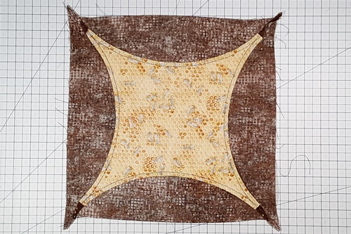 Step 19 Orange Peel Quilt Block: From the back side here's how the completely stitched block looks. Step 19 Orange Peel Quilt Block: From the back side here's how the completely stitched block looks.