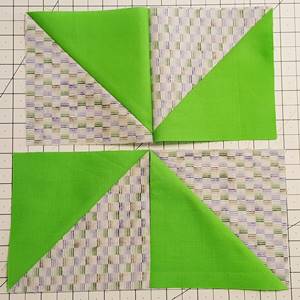 pinwheel quilt block pattern Step 3 row 1 sewn together pinwheel quilt block pattern Step 3 row 1 sewn together