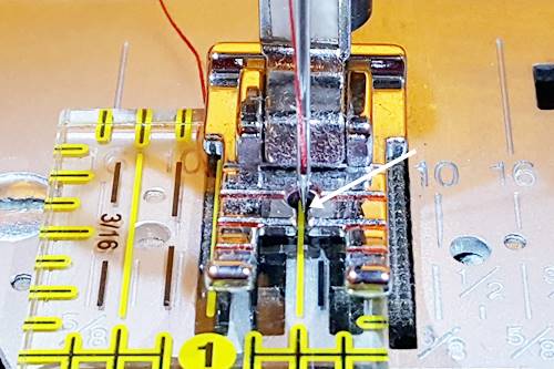 Picture of a scant quarter inch seam on a 1/4 inch pressure foot.