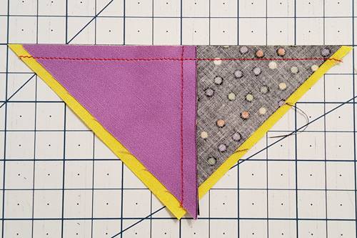 pair one of the quarter square triangle
halves with one of the half square triangle halves. Step 4 With right sides together, pair one of the quarter square triangle halves with one of the half square triangle halves.