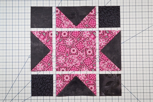 Step 2 Sawtooth Star Quilt Block: Layout  quilt block. Row 1: sm square, flying geese, sm square; Row 2: flying geese, lg square, flying geese; Row 3: sm square, flying geese, sm square