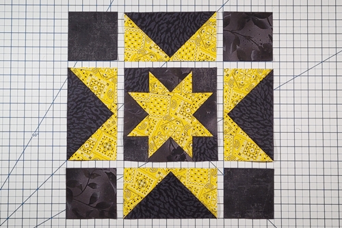 Picture of a double sawtooth star quilt block layout.